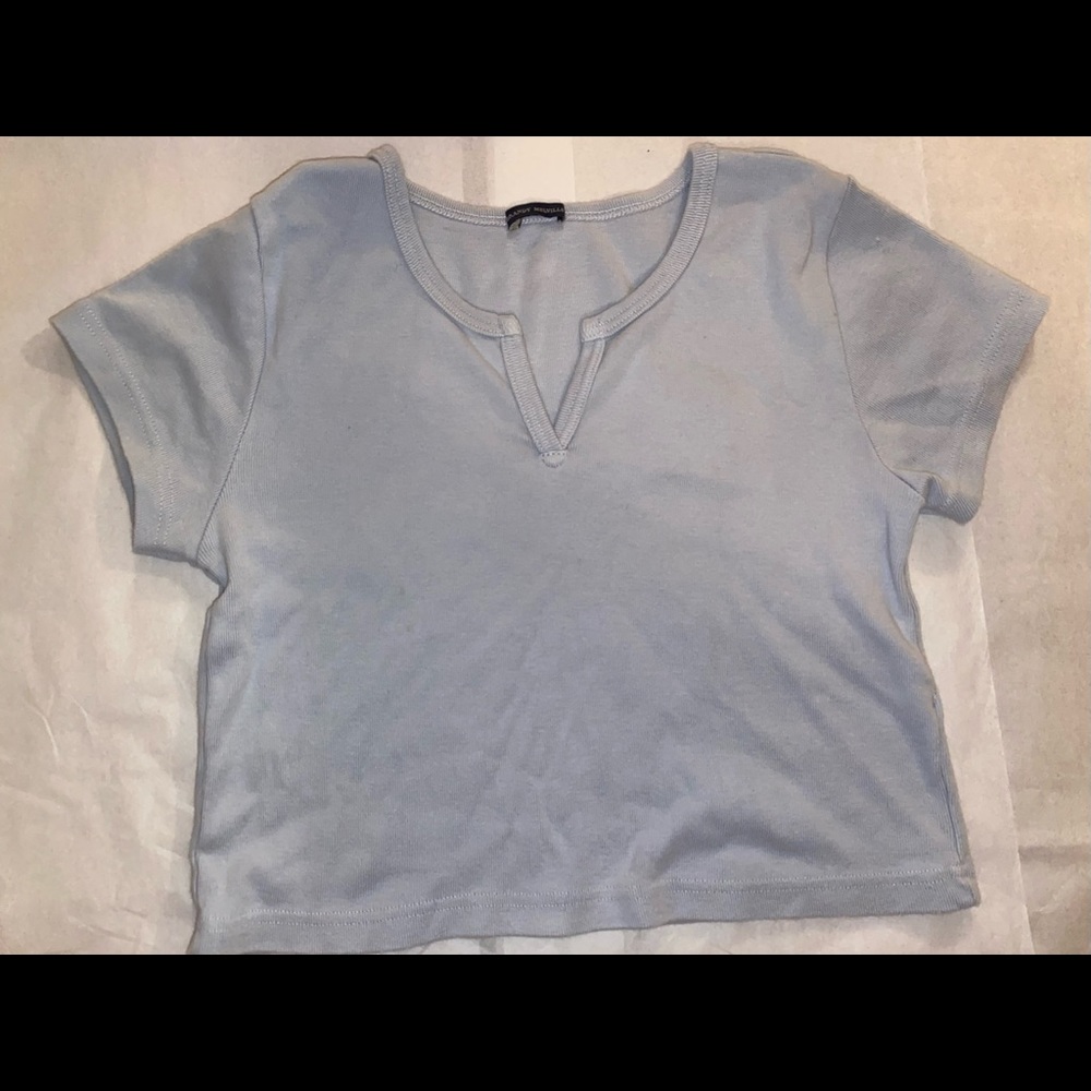 Light blue brandy Melville baby tee shirt. One size fits size S or XS